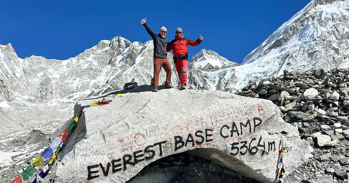 People posing at 5364 meters during Everest Base Camp Trek